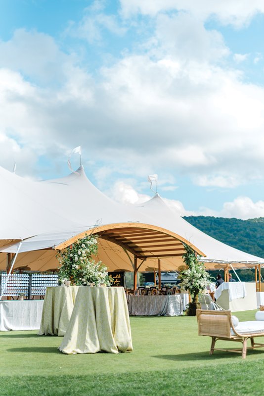 A crisp white Sperry tent welcomes guests to the reception.