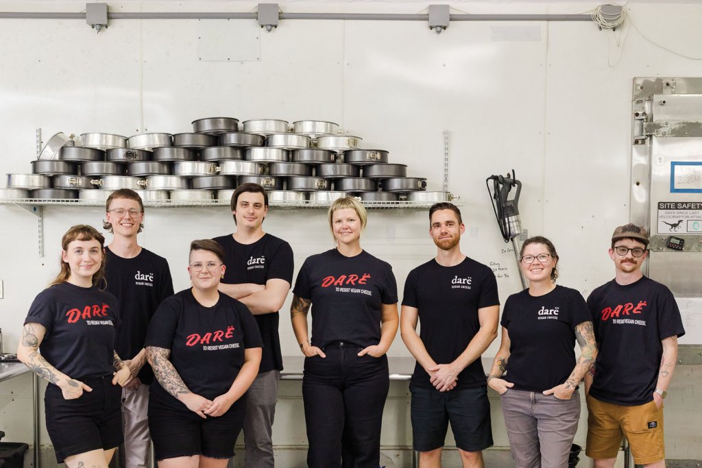 TEAM EFFORT: All cheeses are handcrafted by Darë staff members at the company’s Asheville facility. Hageman (center) is committed to leading a sustainable business by ensuring her staff are paid a living wage, by reducing their carbon footprint, and using recyclable packaging.