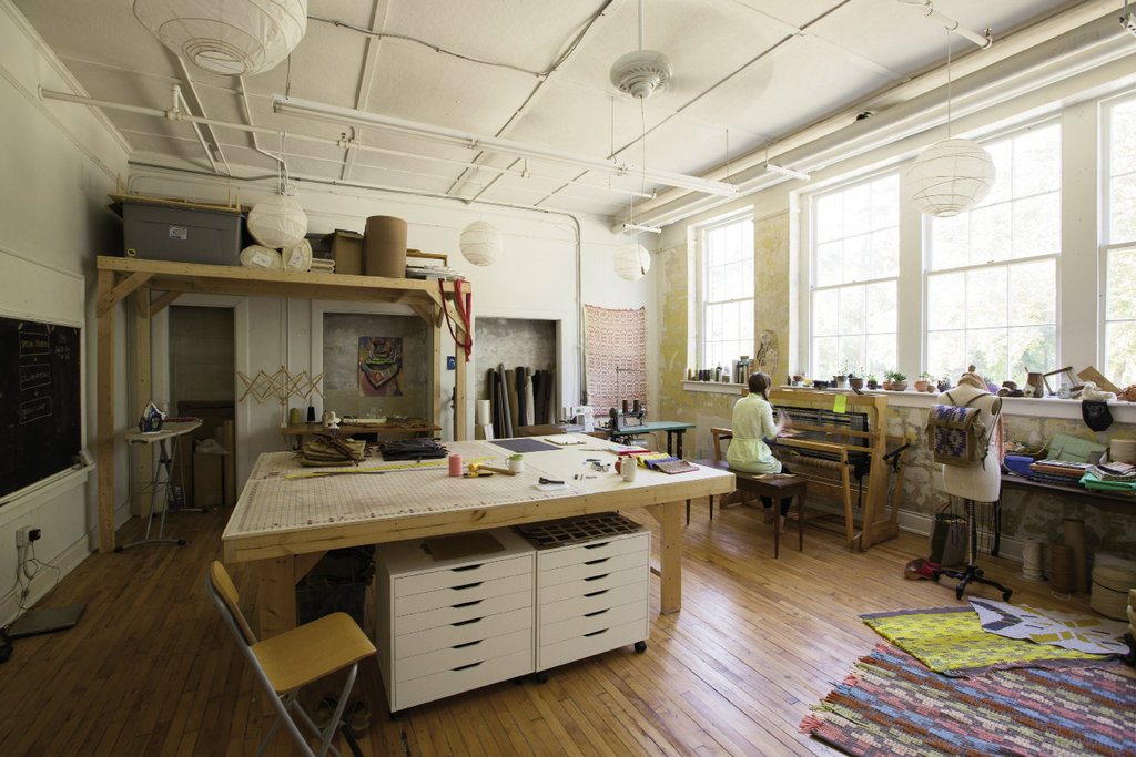 When the old Marshall High School was saved from the wrecking ball in 2007 and converted into artist studios, it spurred a cultural and business revival in downtown Marshall. Textile designer Amber Jensen is among the community of creators now taking up residence.