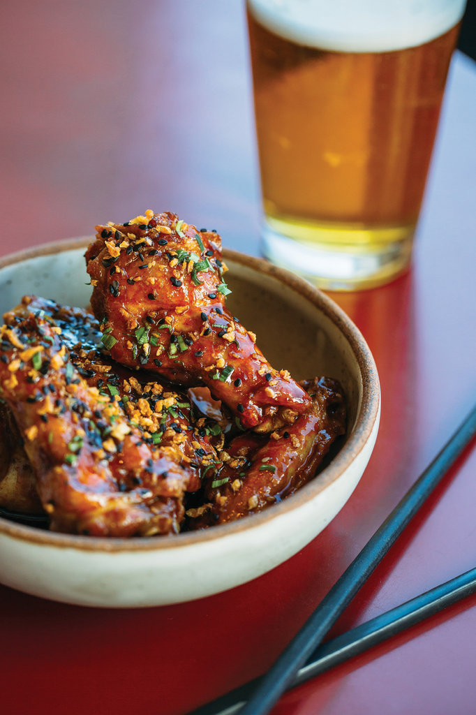 Wonders of the Orient: Gan Shan Station owner and chef Patrick O’Cain serves a slew of Asian dishes, including popular savory-sweet Korean-style wings.