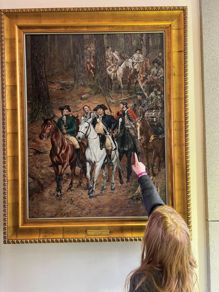 A student admires the glycee replica of Benjamin Cleveland’s War Prize by the painter Don Troiani at the Five Points Museum in Cleveland, TN.