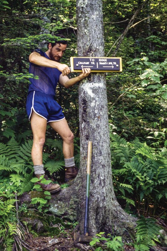 Author installs sign near Shanty Spring in 1978, replacing a spray painted arrow on the once-overgrown, unmarked trail.