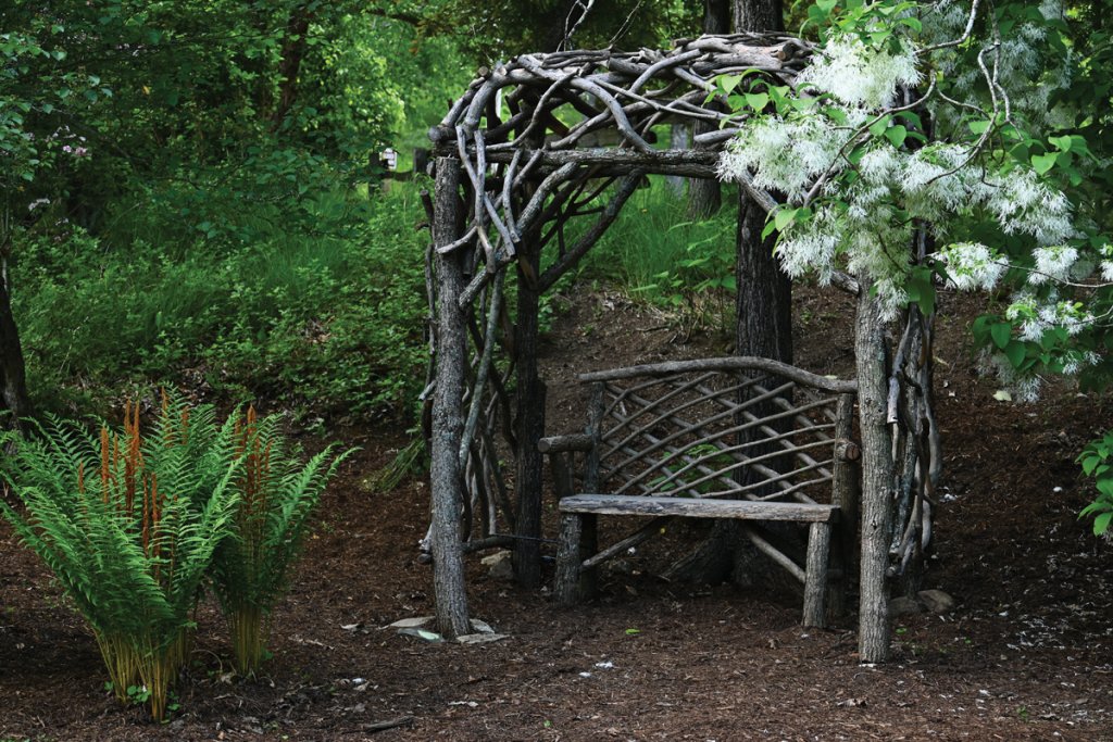 Wooden bench hidden along the path.