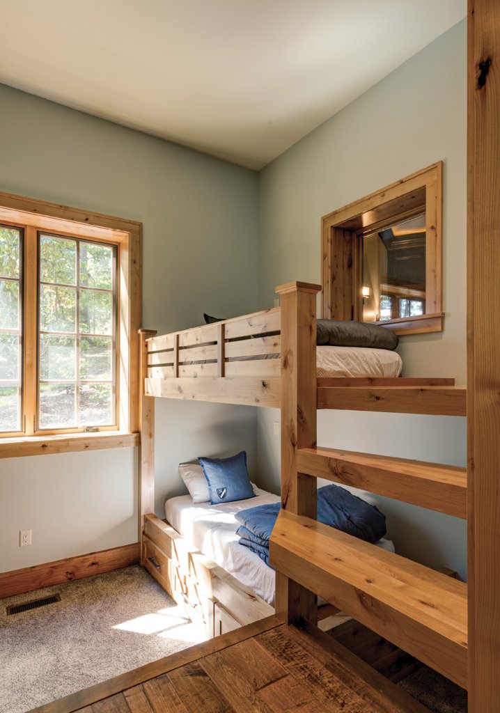 Slumber Party Perfect - The four-bed bunk room is ideal for rambunctious kids. Unconventionally, steps lead up and down to reach the upper and lower beds.