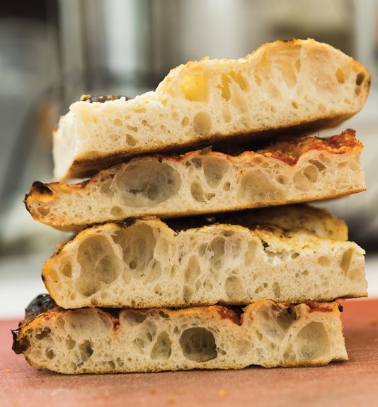 Mission Pizza’s crust is thicker than traditional round pizza doughs, and comes in a square shape instead of the typical round style. Although unusual, the texture complements the sauces and toppings for a standout meal.