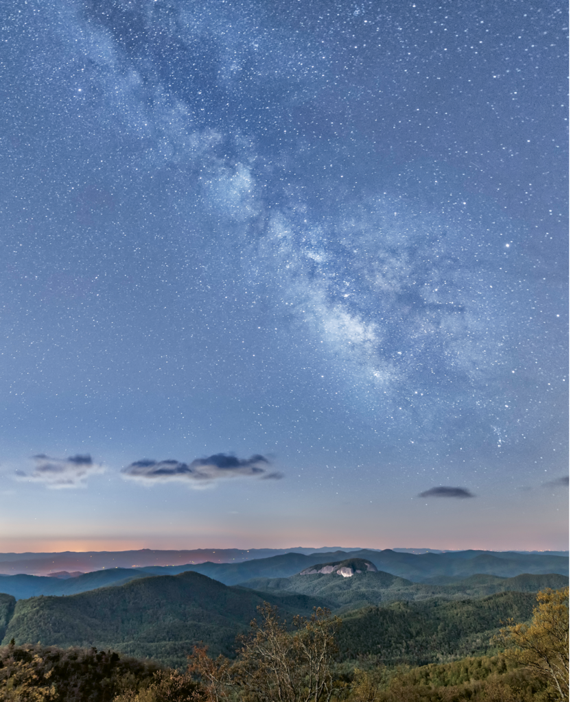 FINALIST - LOOKING GLASS AT NIGHT - Kathryn Greven - From Pounding Mills overlook on the Blue Ridge Parkway, Greven shot this  image at 3 a.m.,  using several exposures to capture the brilliance of the Milky Way over Looking Glass Rock.  Amateur category