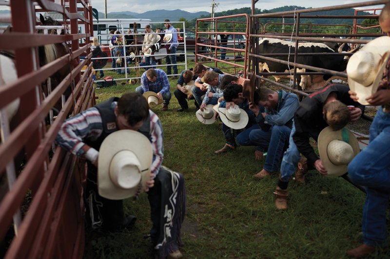 In addition to the national anthem, the rodeo’s competition rounds are prefaced by a group prayer that asks for safety for the riders and animals.