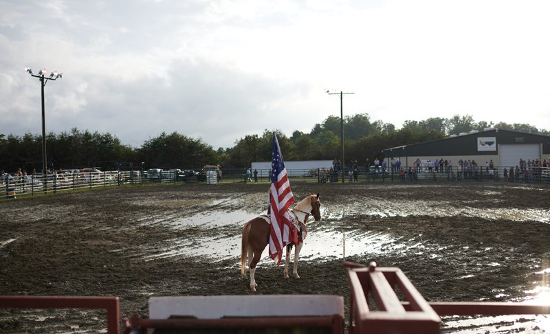The rodeo gets underway as summer sunsets over the Madison County Fairgrounds offer a feast of light for the photographer.