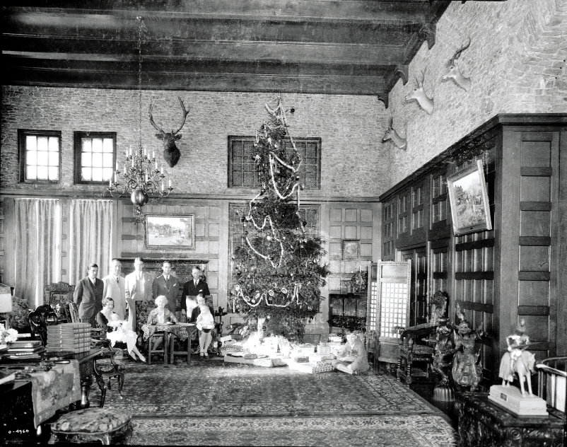 First Family: The Seelys, gathered next to a fittingly grand Christmas tree in one of Overlook’s great rooms, lived at the castle until the early 1940s.
