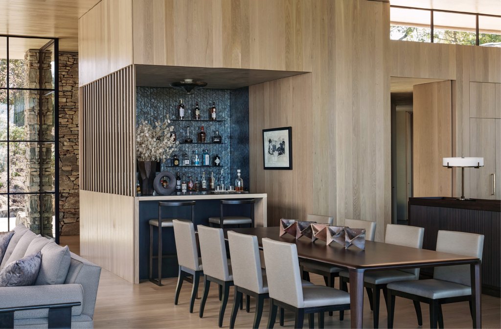 Grab a Drink - Carlton chose streamlined finishes throughout the home, emphasizing the interior connection to nature.