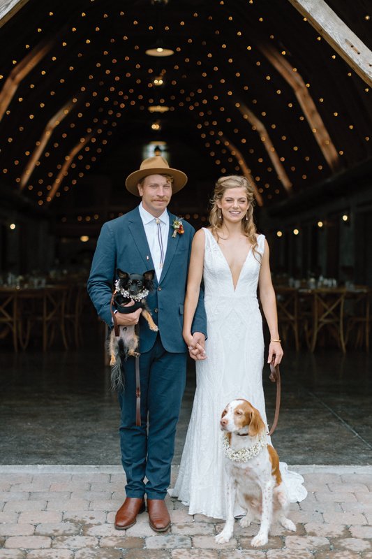 Wreathed in flower collars, the pair’s pups acted as wedding attendants.