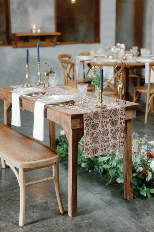 The sweetheart table also included a small vase of forget-me-nots, a favorite of the grandmother-of-the-bride.