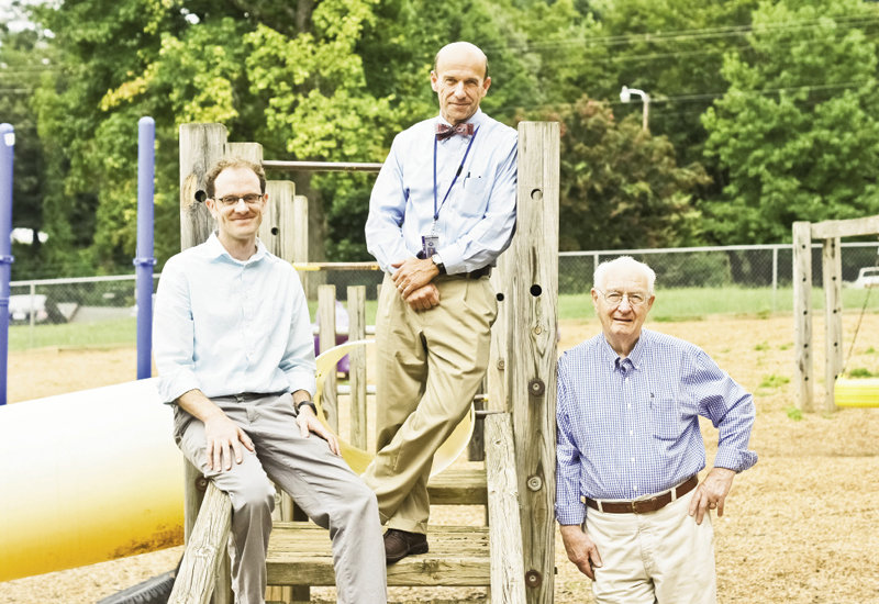Left to right, landscape architect Joel Osgood, Principal Dr. Gordon Grant, and Conner Fay with the Yale Club all have a stake in the new outdoor learning environment planned for Hall Fletcher Elementary in West Asheville.