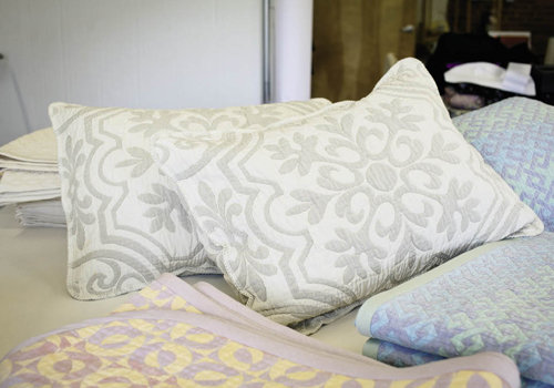 O’Bryan’s sewing company creates  pillow shams and blankets, which are sold in small retail shops in Florida, North Carolina, Tennessee, and Virginia.