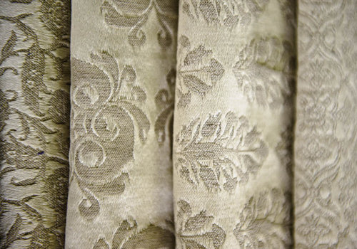 Damask fabrics are used to make coverlets and shams.