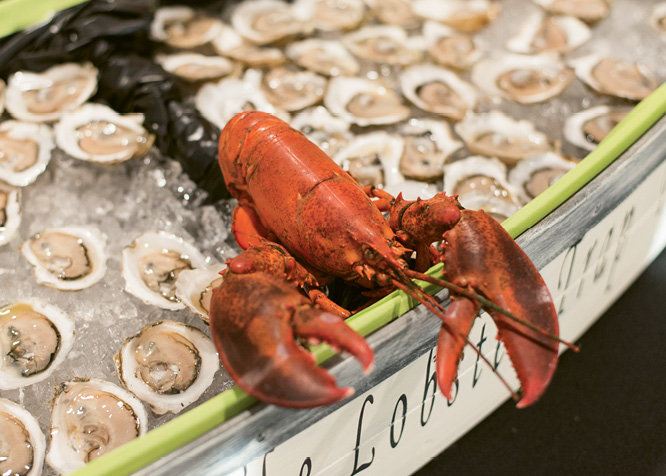 An array of seafood and fresh shucked oysters was provided by The Lobster Trap.