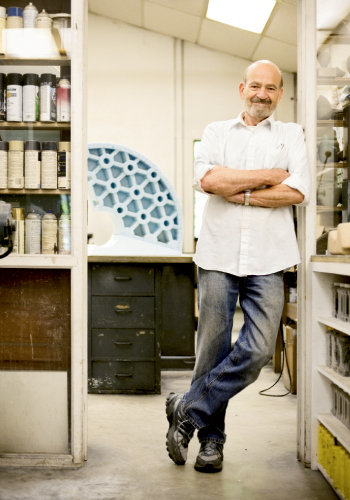 At his Penland studio, Mark Peiser (shown) forges a style that has evolved from figurative designs to his current series, Cold Stream Cast Vessels.