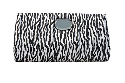 • 12 Zebra print clutch, $69, The Dande Lion