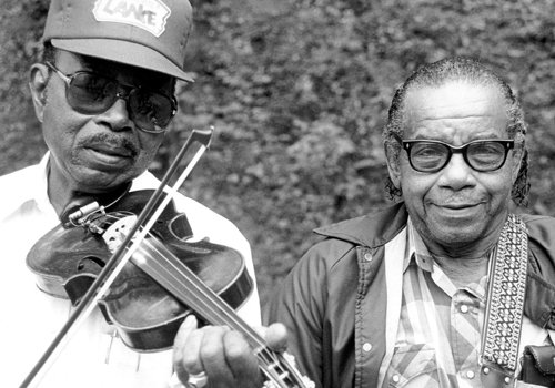 Joe and Odell Thompson (1918-2012 and 1911-1994) The Thompsons were first cousins who lived near Mebane. They kept alive the long-running tradition of black string band music in North Carolina.