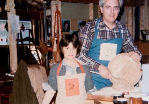 Michelle with her dad in their Leicester home, which was a 16-sided roundhouse that Bob built