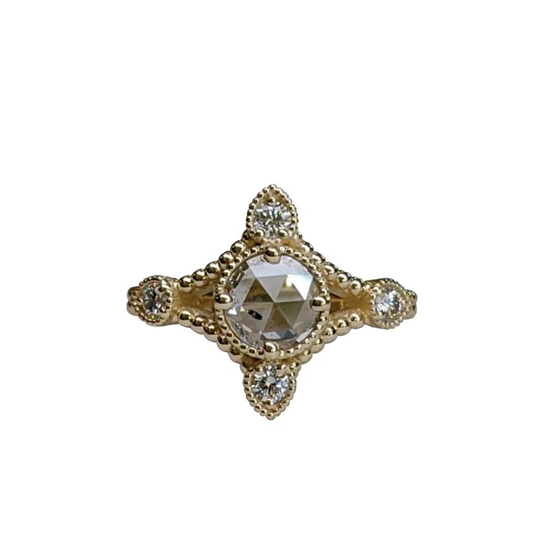 Eye Candy - Neva Ring. 14 karat recycled yellow gold, .5 carat white rose-cut diamond, 4-2.5mm SI1-G white round brilliant diamonds. $3,900. Stephanie Ellis Jewelry, Asheville. stephanieellisjewelry.com