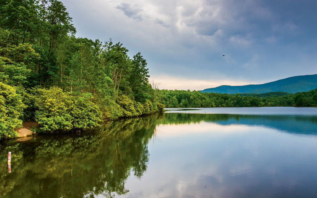 Julian Price Memorial Park and lake, located at Blue Ridge Parkway milepost 297, sits on 4,200 acres at the foot of Grandfather Mountain. Explore the area via an easy trail that encircles the lake, or rent a canoe or kayak to get out on the water.