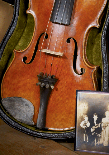 a Stradivarius violin that was found on the property with a photo of Hardison’s children