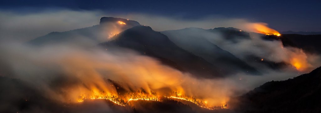 1st Place Professional Category -- Table Rock Wildfire - Cathy Anderson A forest fire rages methodically down Table Rock towards  Linville Gorge, a popular destination in Pisgah National Forest. {Professional} @cathyandersonphoto